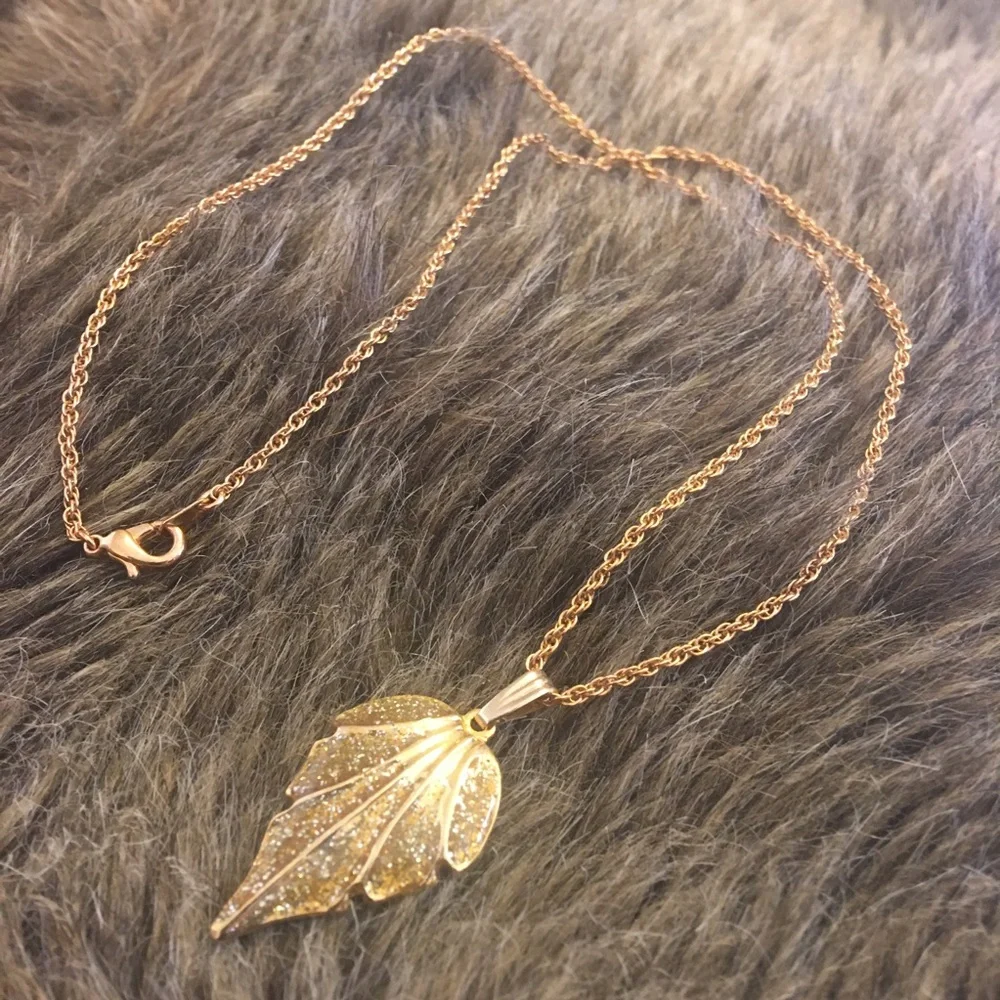 Sparkle enamel leaf pendant on gold chain necklace